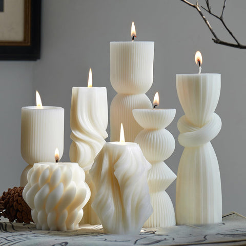 NATCENSE 7-pack pillar candles in white ribbed finish for elegant home ambiance.