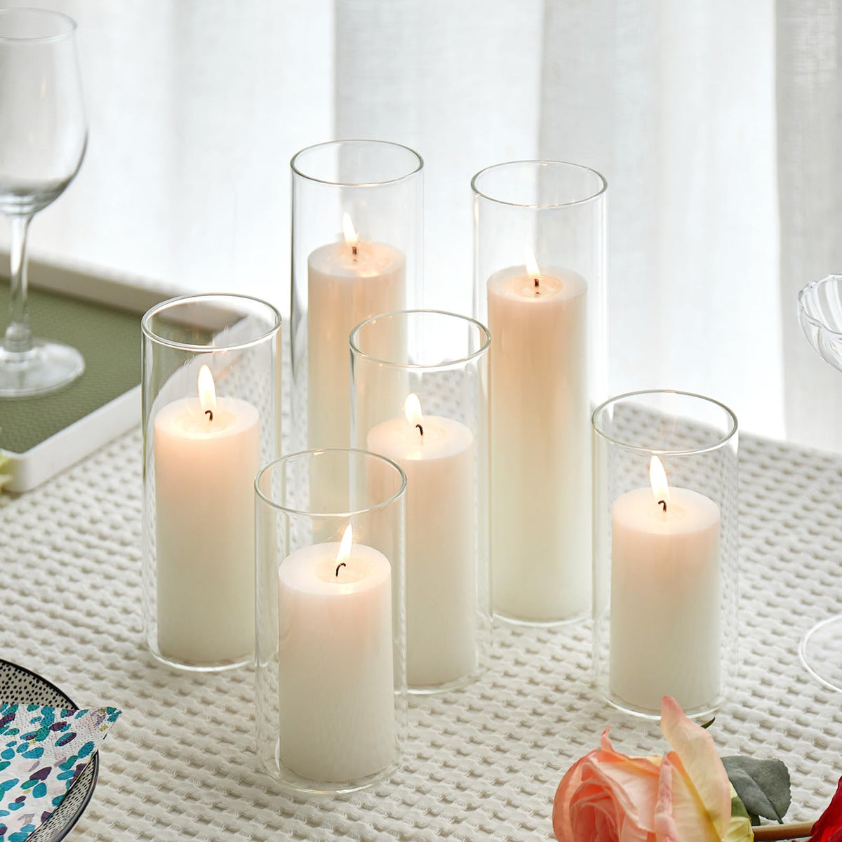 NATCENSE set of six white pillar candles with hurricane holders, ideal for elegant centerpieces