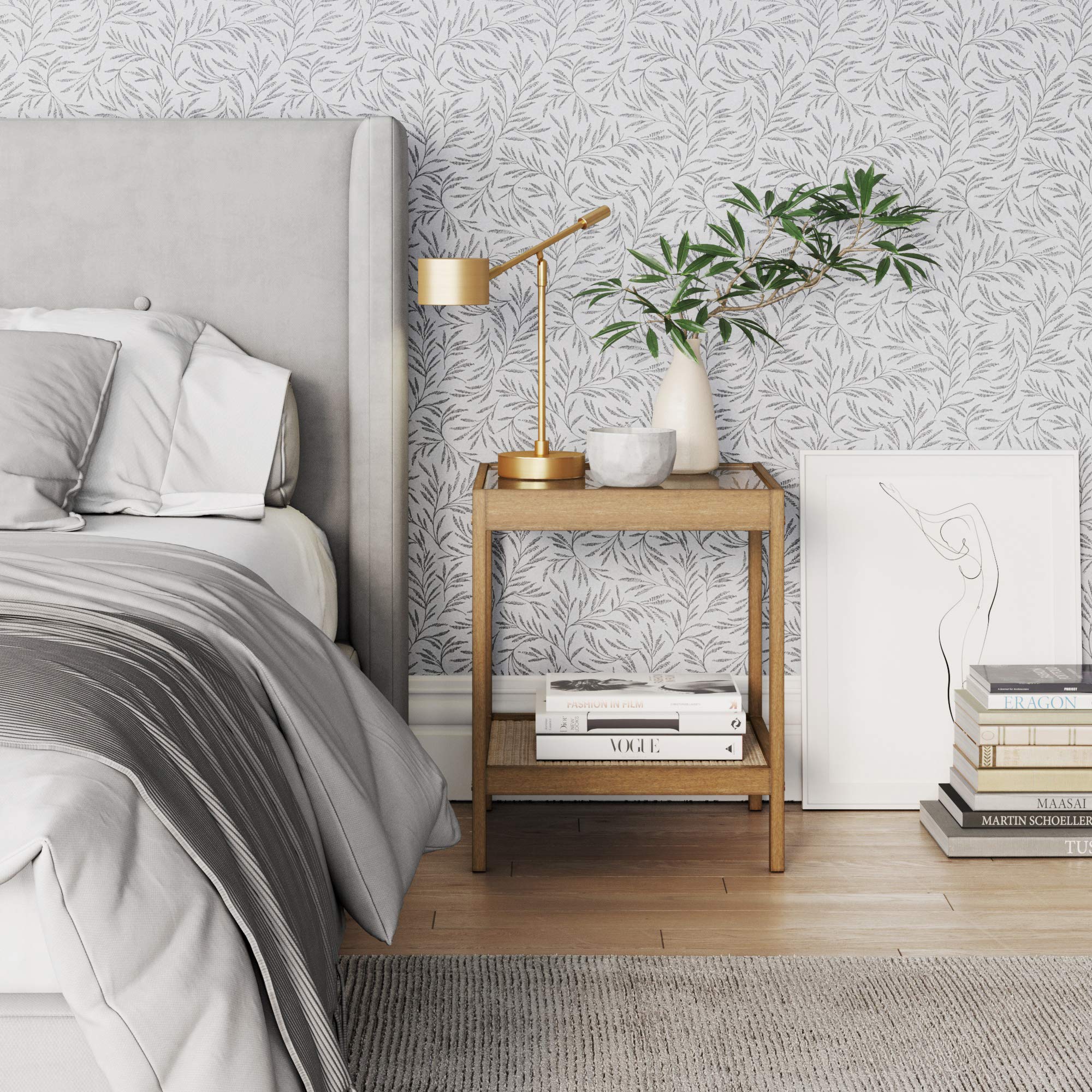 Hayes open rattan shelf provides organized storage for magazines.