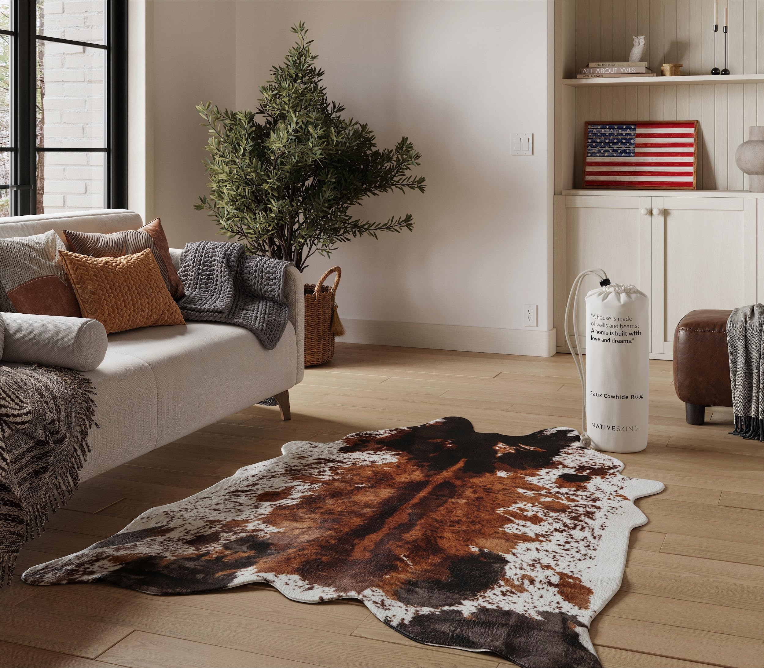 NativeSkins faux cowhide rug in brown flatlay, durable and non-shedding.