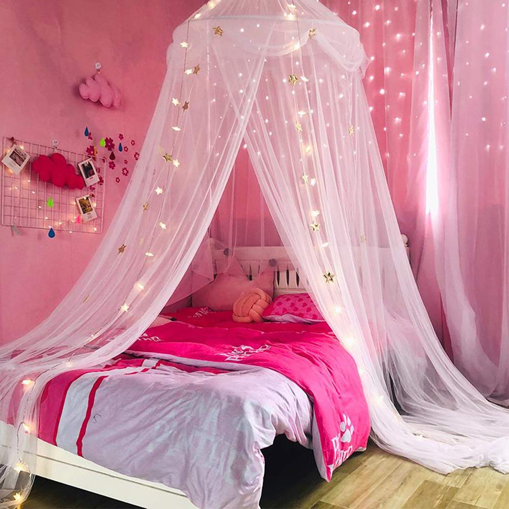 Nattey dome mosquito net large surrounds the bed for peaceful nights.