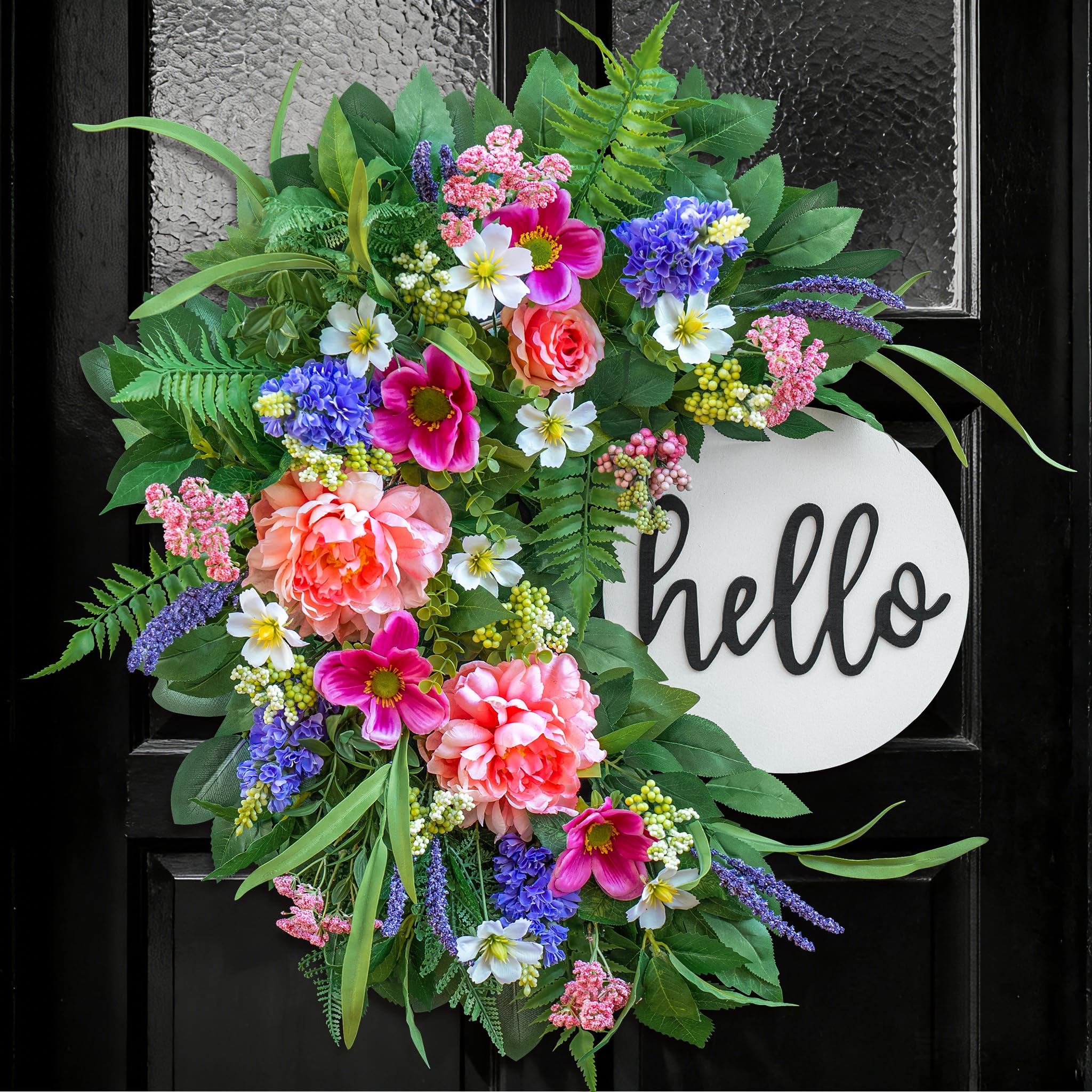 NaturaWre 24-inch Spring Wreath with wooden welcome sign enhances curb appeal.