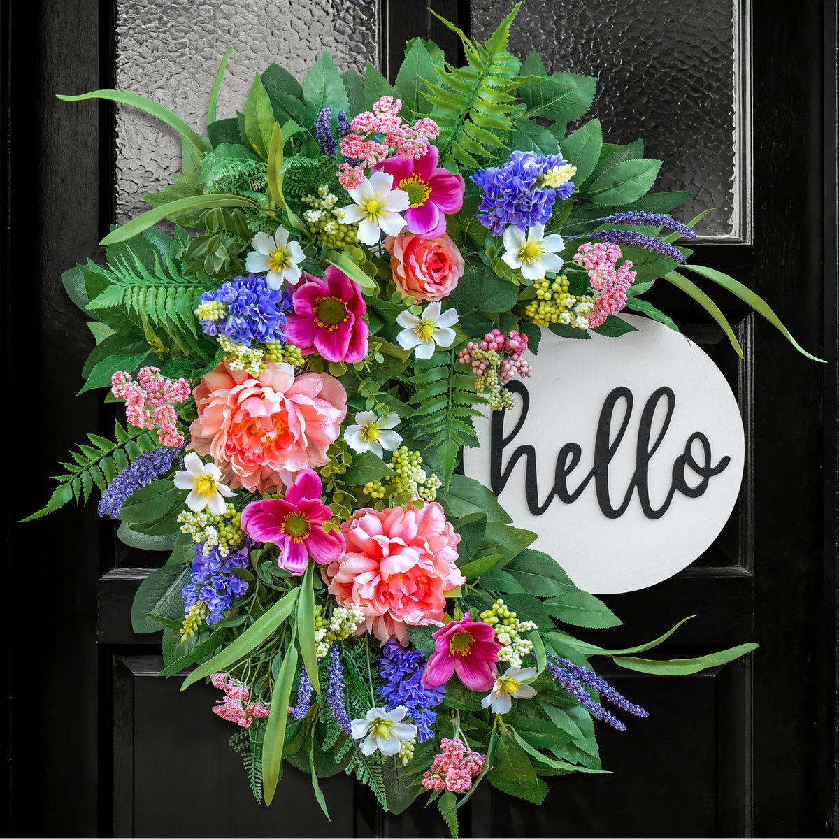 NaturaWre 24-inch Spring Wreath with wooden welcome sign enhances curb appeal.