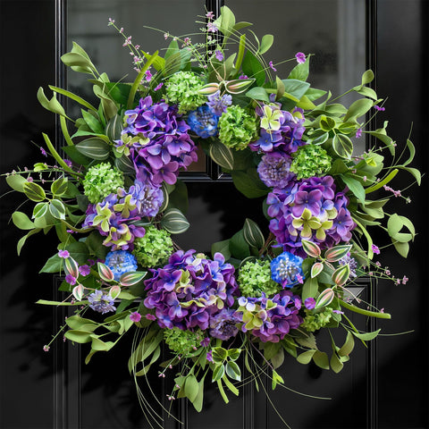 NaturaWre 24-Inch spring wreath on front door with hydrangea and thistle enhances curb appeal