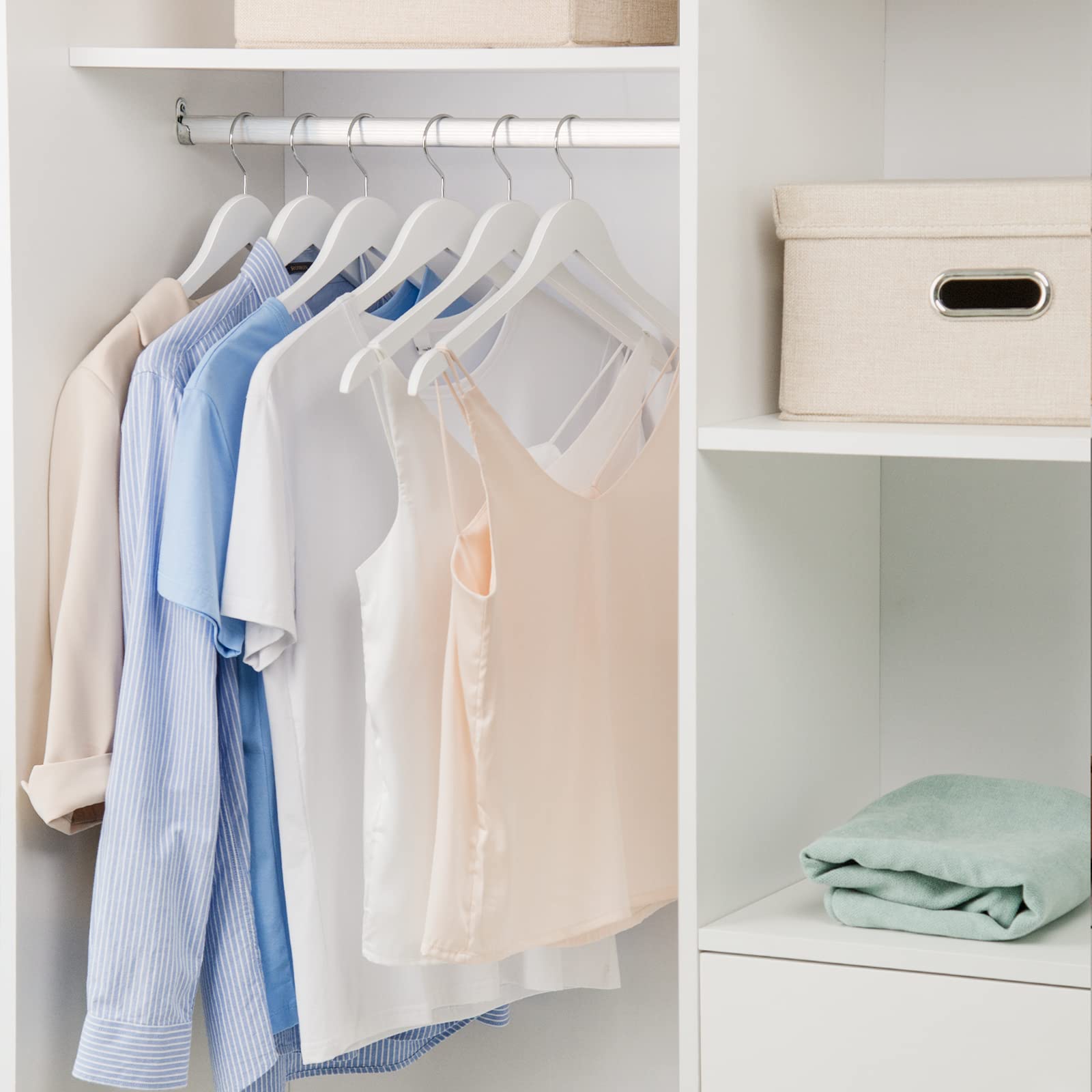Nature Smile white hangers set ideal for closet organization.