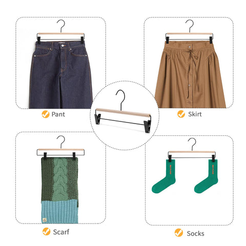 Nature Smile beech wood hangers with adjustable clips keep skirts securely in place.