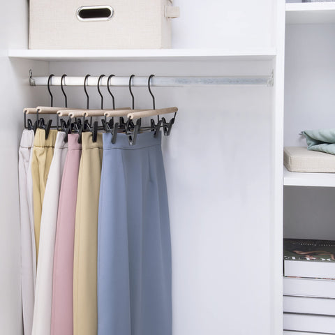 Nature Smile sturdy beech wood hangers support heavier pants and long skirts.