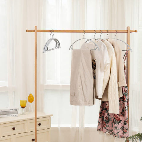 Nature Smile multi-function hanger holds coats, sweaters, scarves, and belts neatly.
