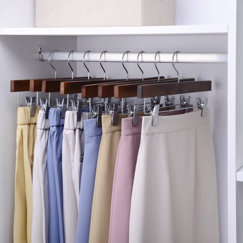 Nature Smile solid lotus wood deluxe pants hanger side view, smooth surface protection.