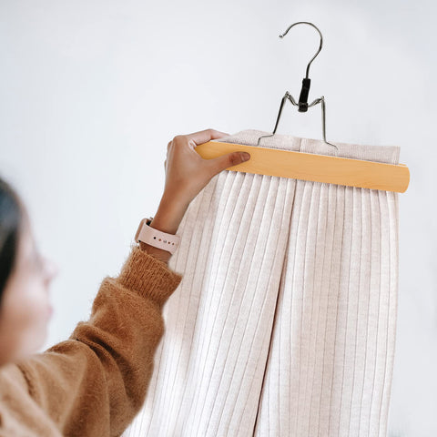Nature Smile slim-profile hanger saves closet space
