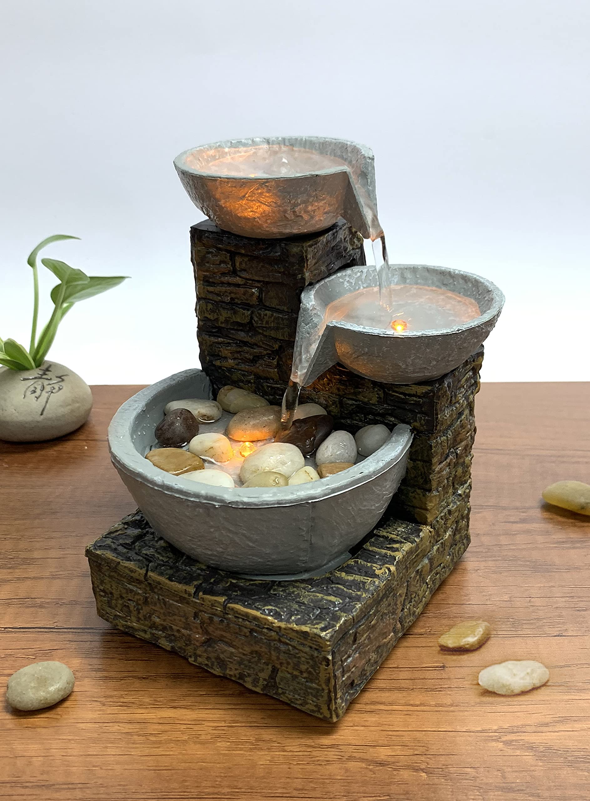 Natural river rocks included for a lifelike waterfall look