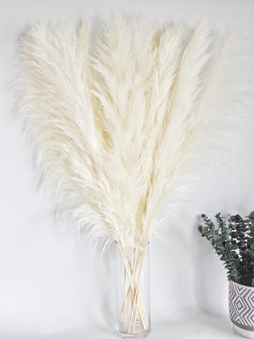 Naunauya beige pampas grass creates calm coastal-inspired mantel decor.