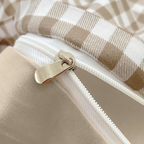 Nayoroom brown gingham pattern; warm, inviting bedroom ambience.