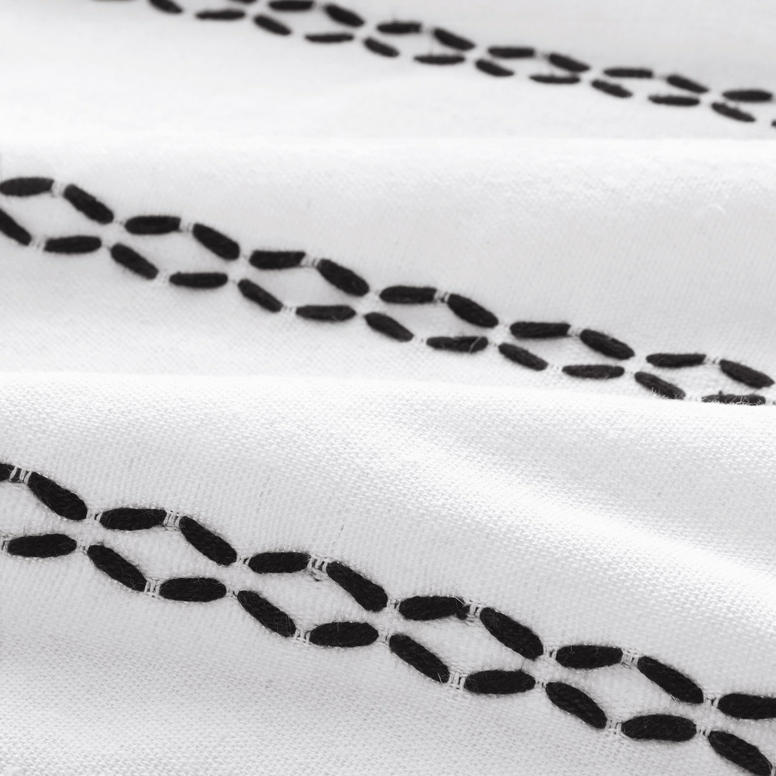 Drape and weave of linen fabric offers privacy while letting light through.