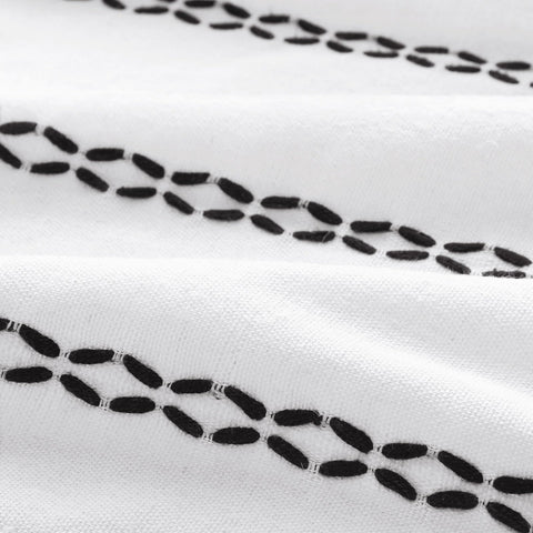 Drape and weave of linen fabric offers privacy while letting light through.