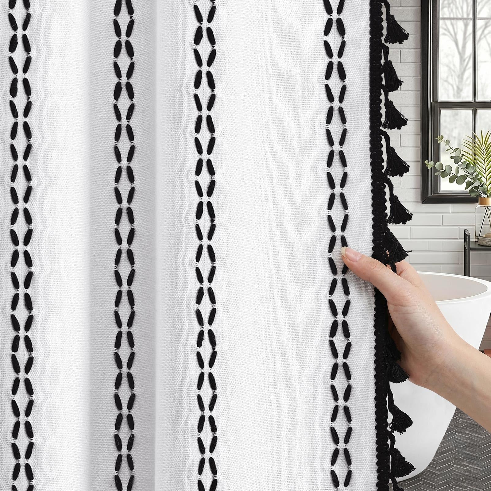 Close-up of tassel accents on the NDDYCU shower curtain.