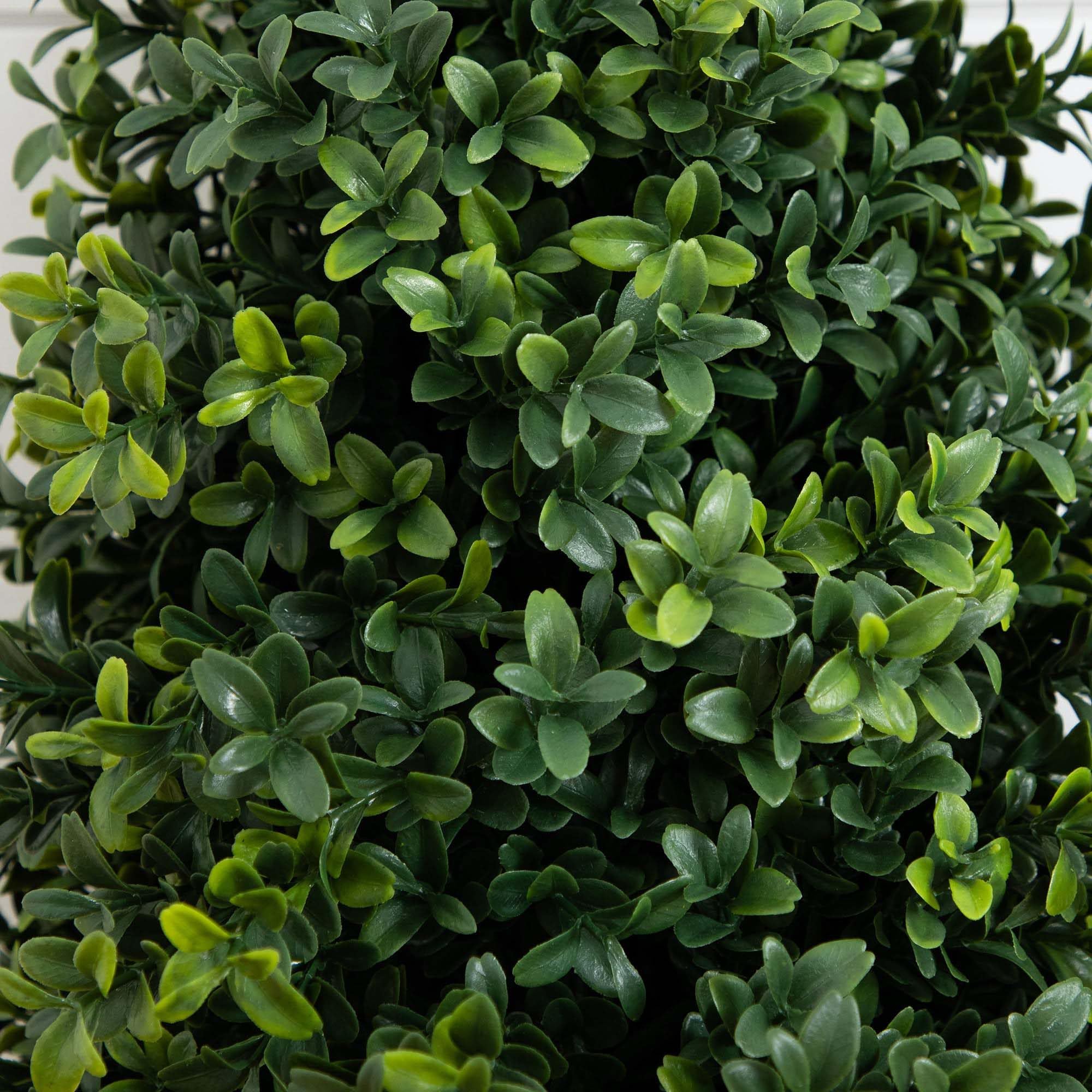 Nearly Natural UV-resistant boxwood foliage withstands sun and weather.