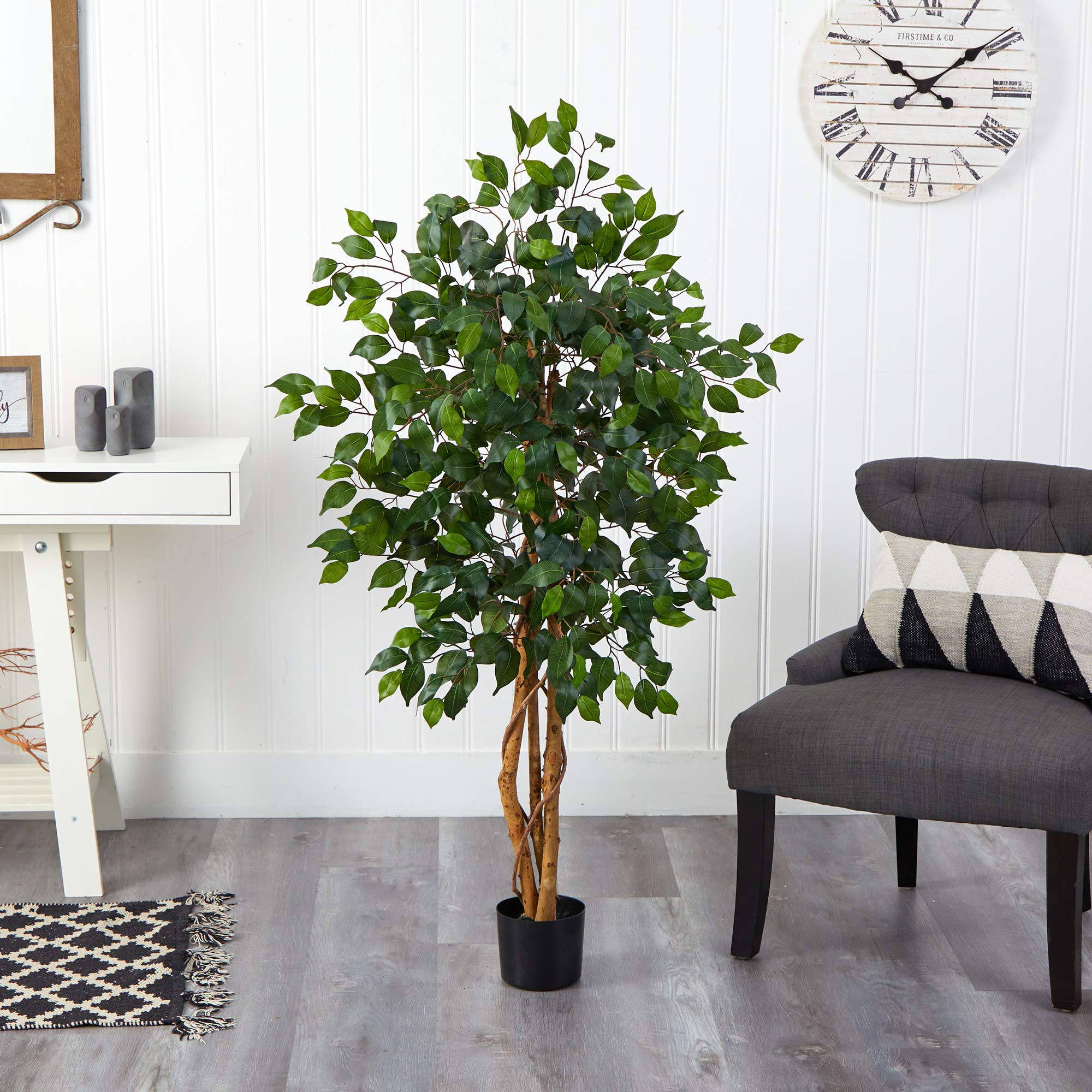 Nearly Natural ficus tree enhances living room decor with year-round greenery.