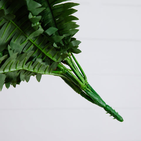 Nearly Natural hanging fern display showcasing cascading fronds for graceful room decor.