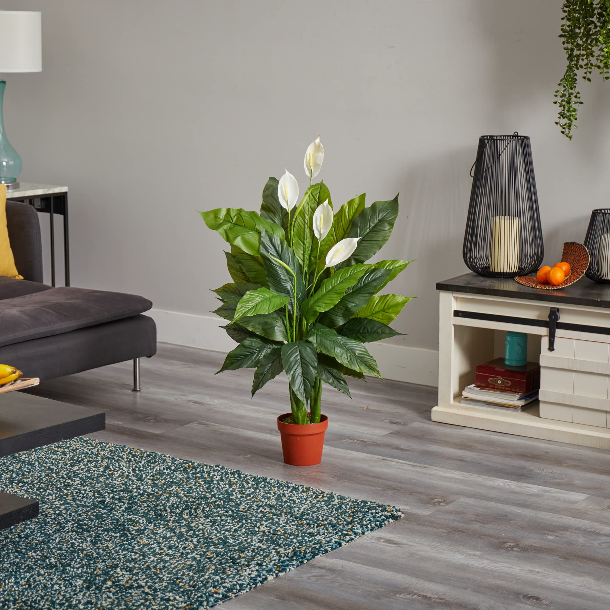 Nearly Natural Peace Lily 42in with green foliage adds year-round greenery.