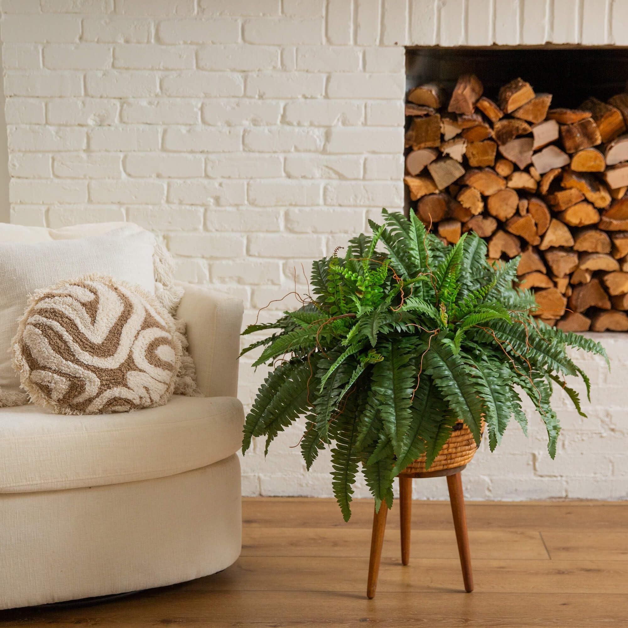 Nearly Natural pedestal display fern set adds vertical interest and lush charm.