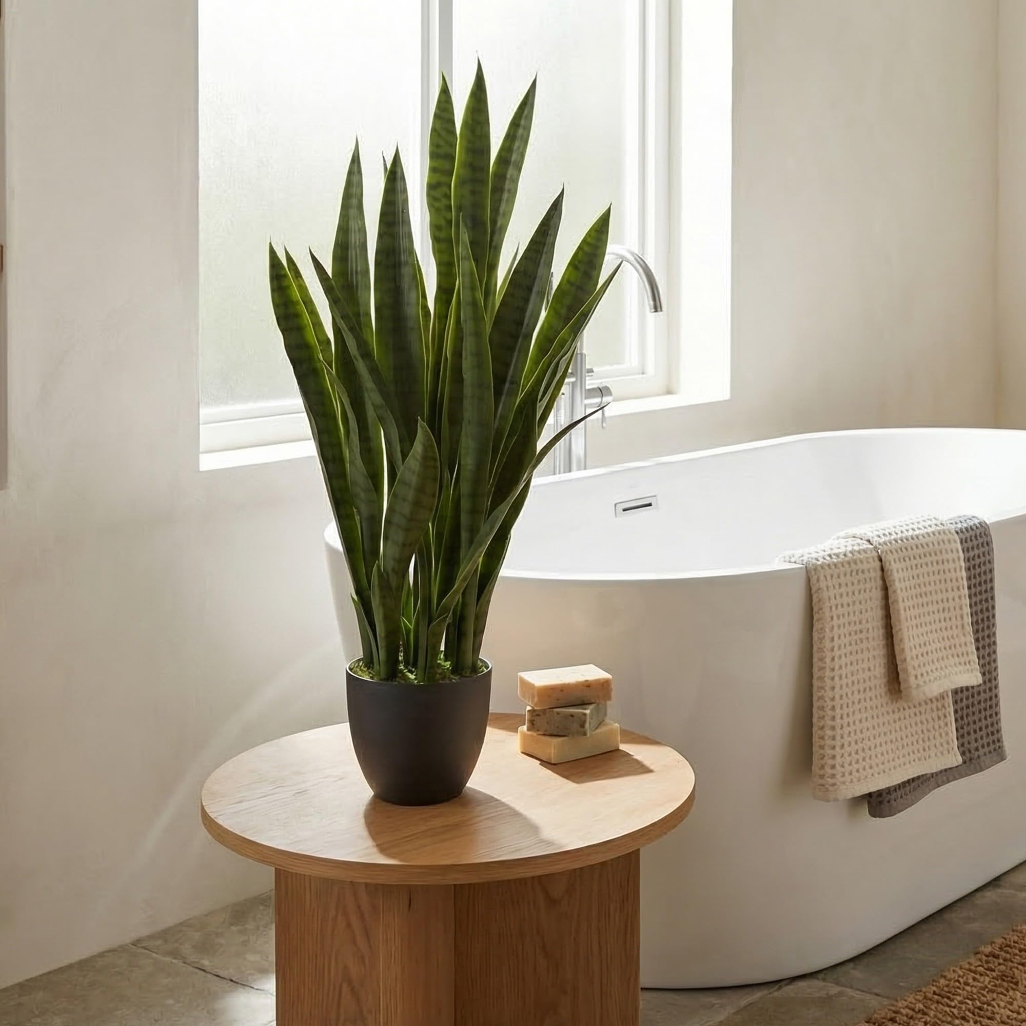Nearly Natural 35in sansevieria greenery stands tall for office decor.