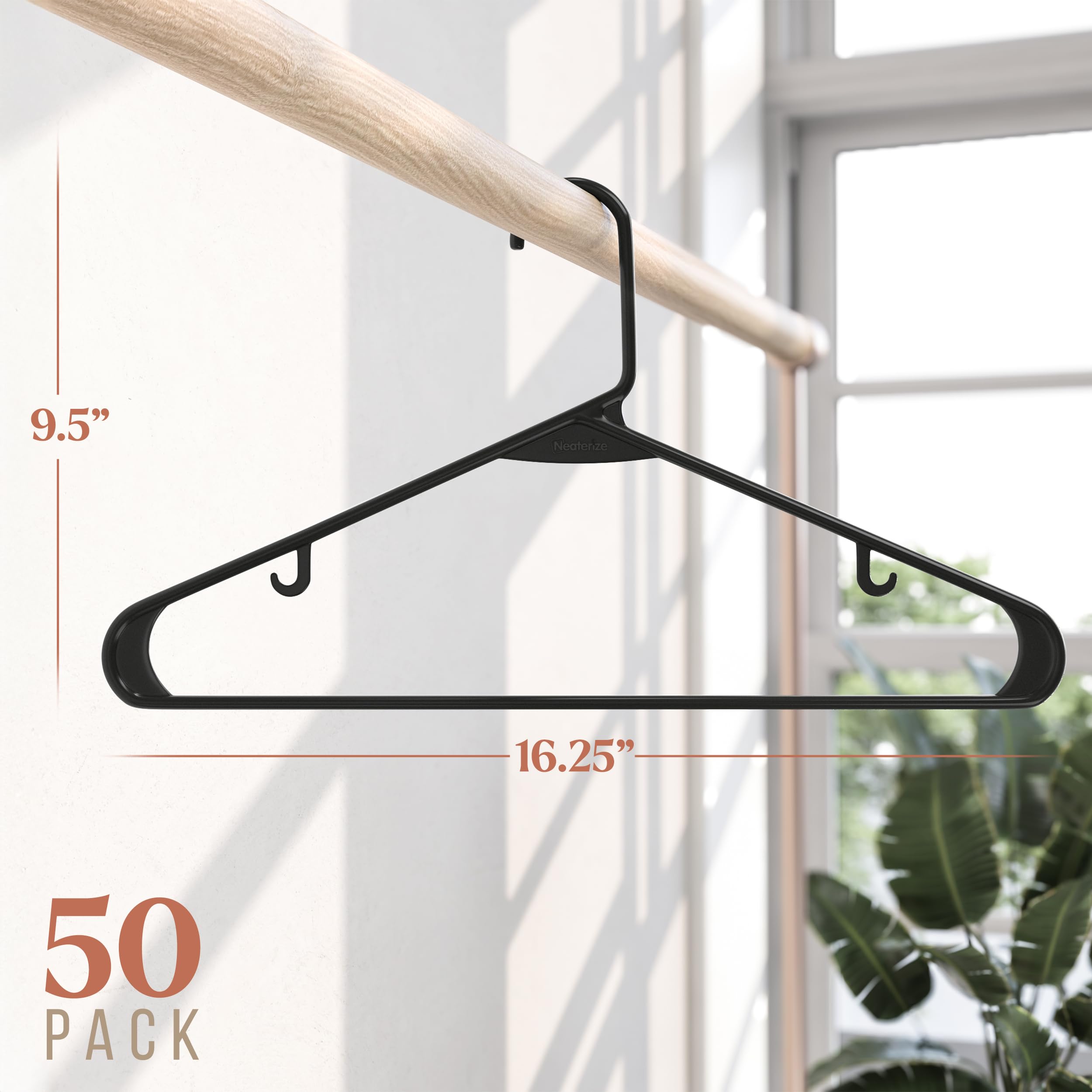 NEATERIZE 50-pack black hangers maximize closet space with a slim, wrinkle-reducing design.
