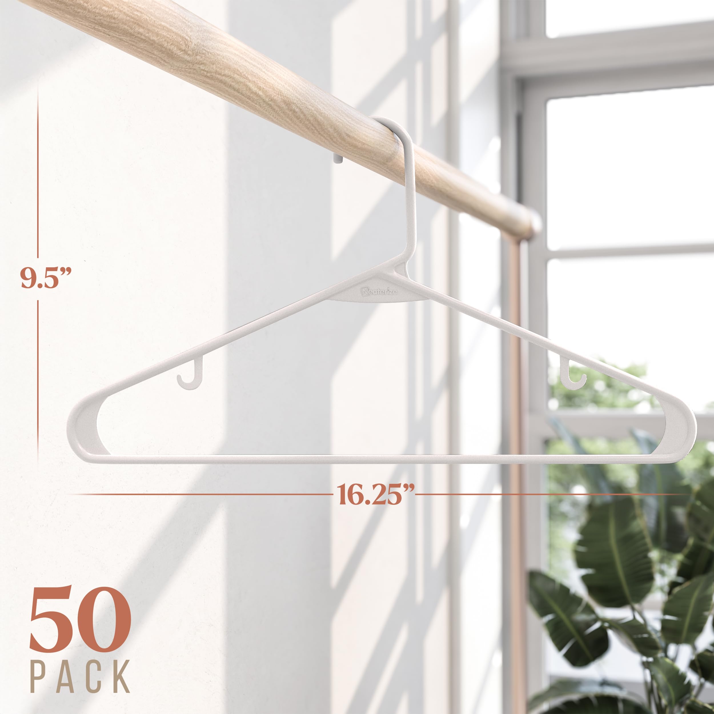 NEATERIZE space-saving hangers promote a clutter-free closet with a slim profile.