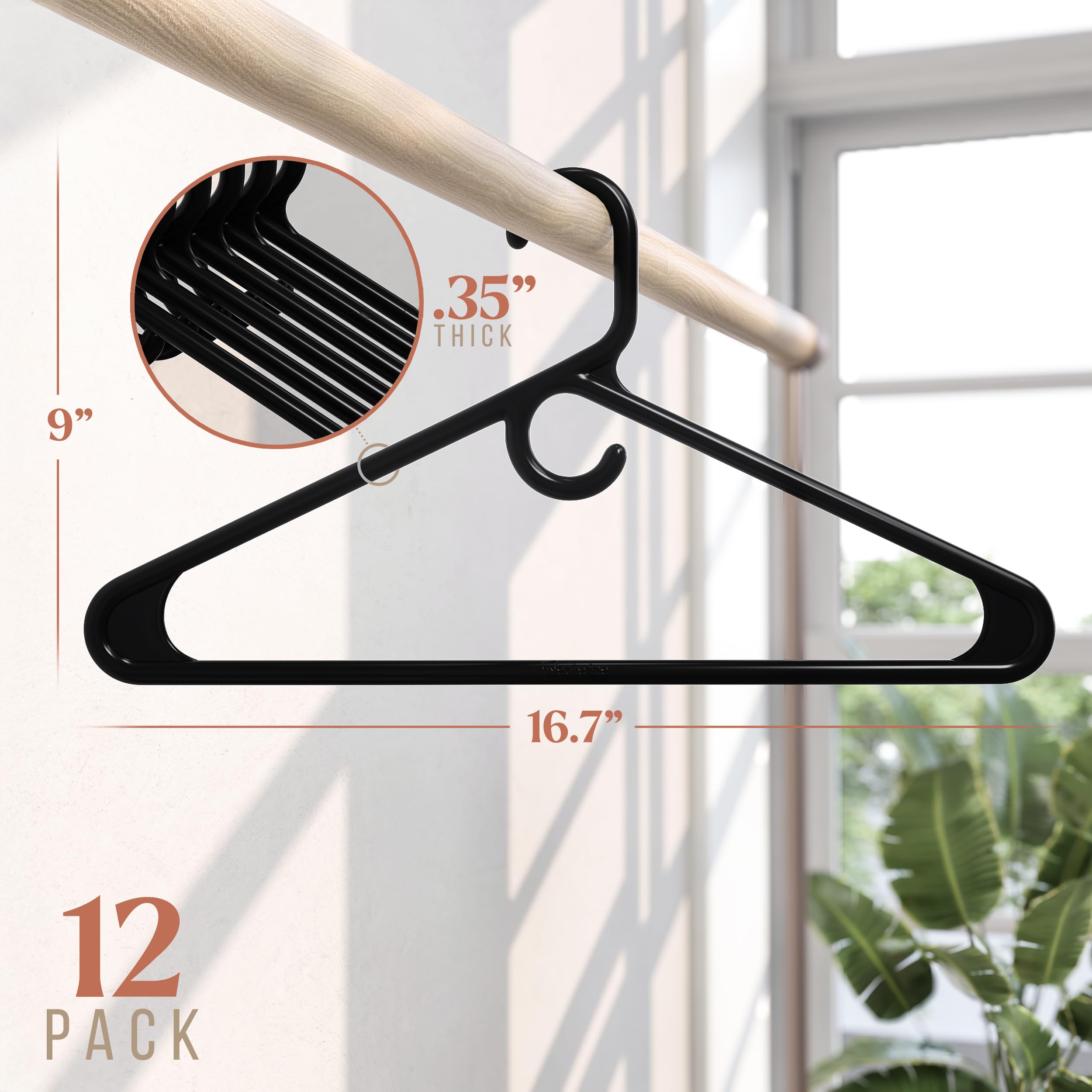 NEATERIZE hangers with reinforced edges highlighting sturdy profile for jackets