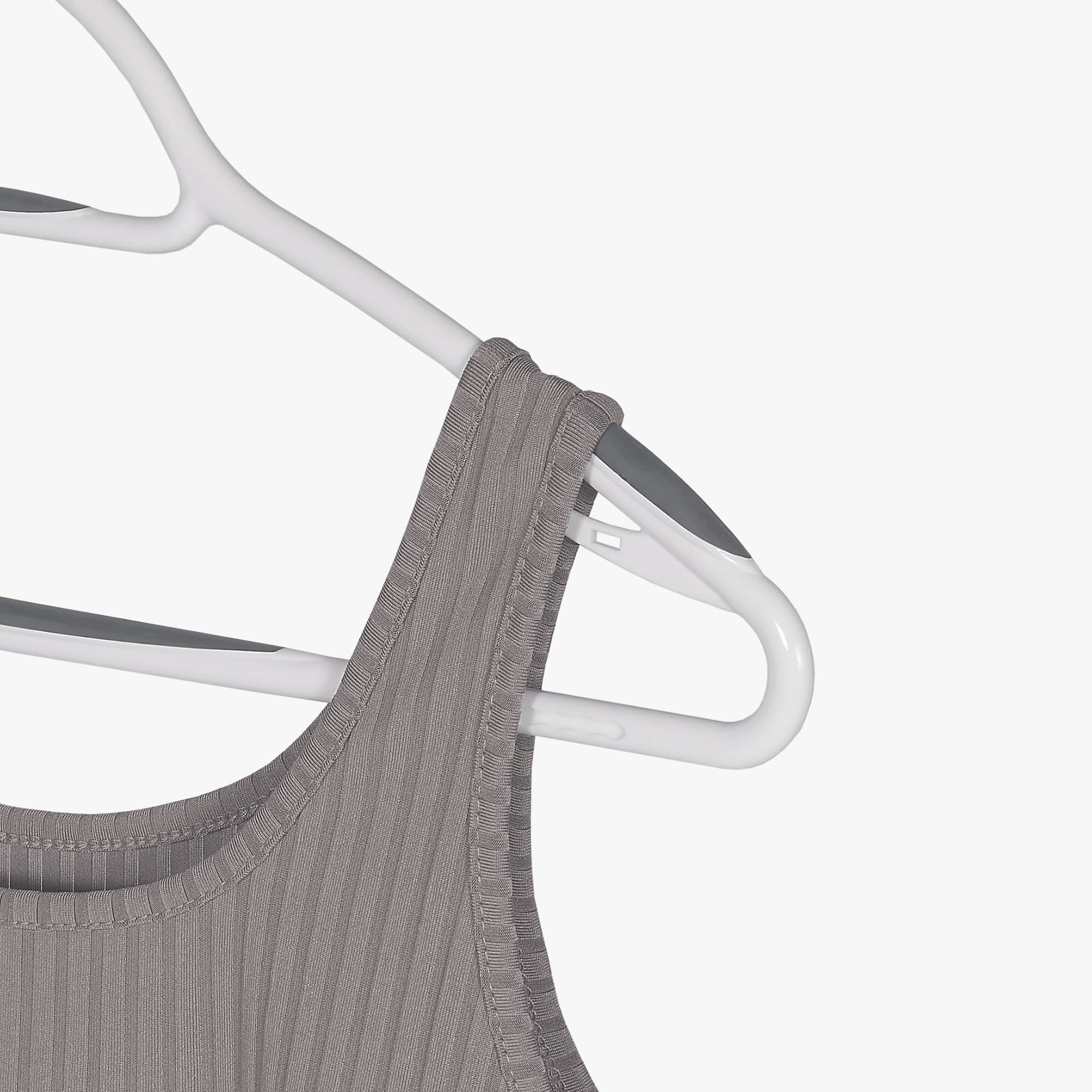 Neatfreak deluxe non-slip hangers with pants bar organize trousers securely.