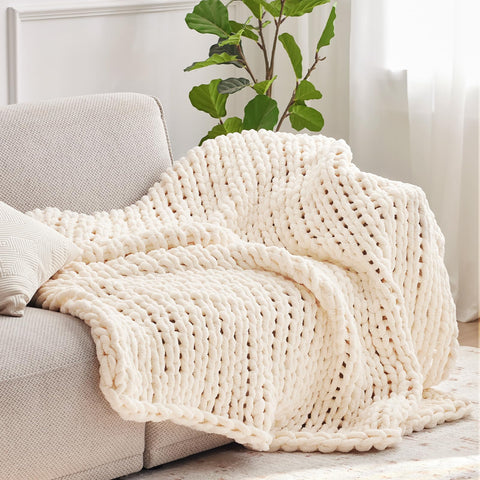 Negwoo cream throw on bed highlighting plush surface and comfort