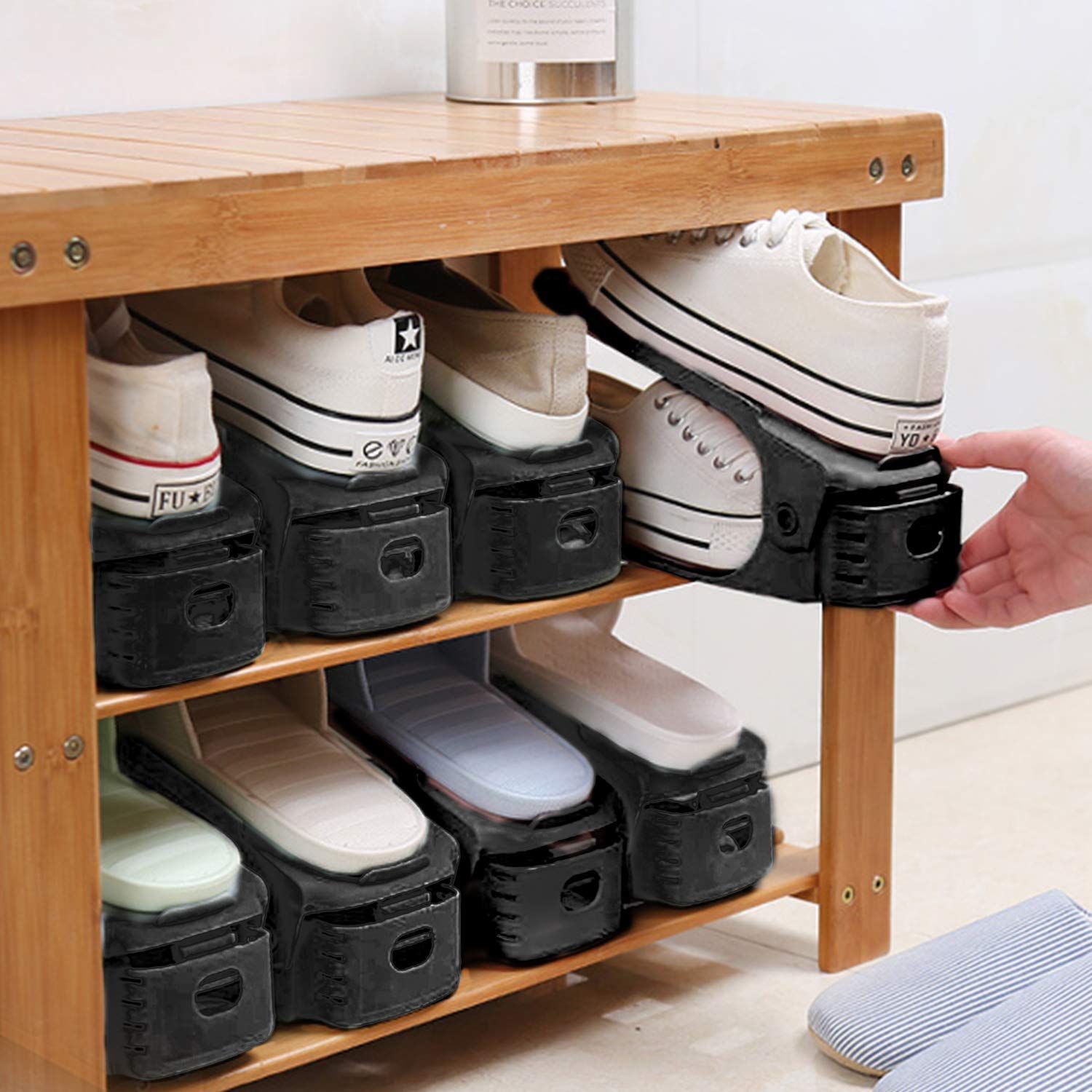 Neprock Shoe Rack in closet demonstrating tidy wardrobe organization.