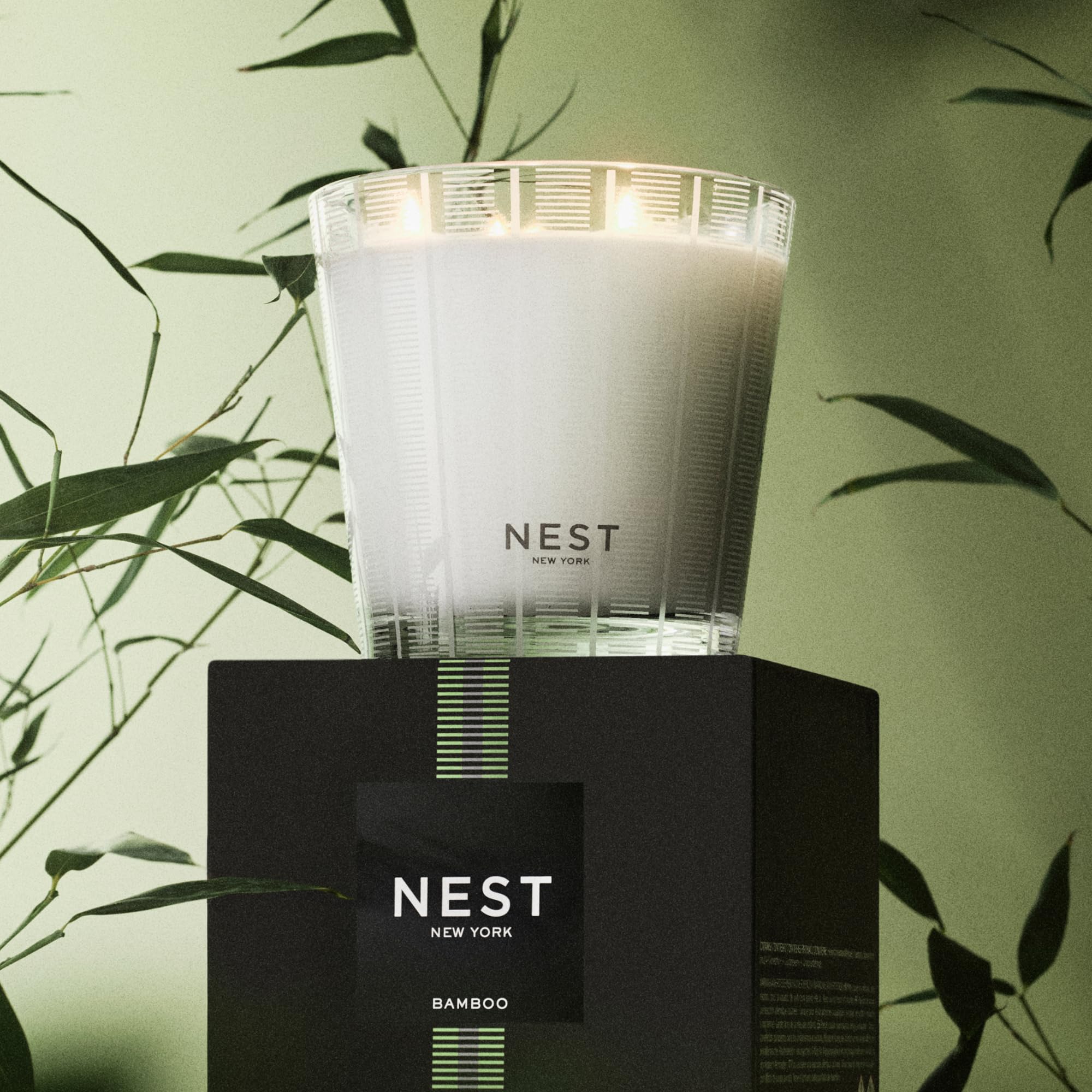 NEST New York Bamboo candle scent diffusion fills a room with floral notes