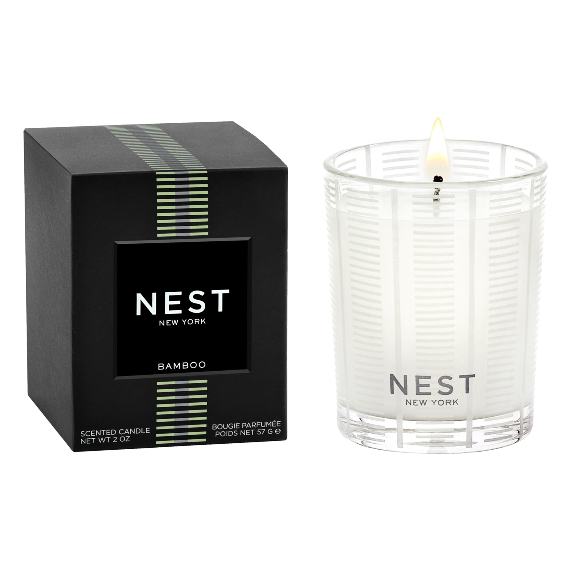 NEST New York Bamboo votive in frosted glass vessel enhances ambience.