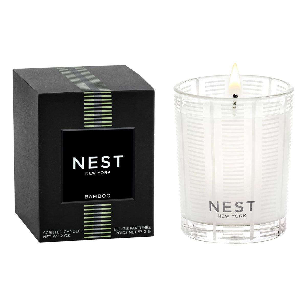 NEST New York Bamboo votive in frosted glass vessel enhances ambience.