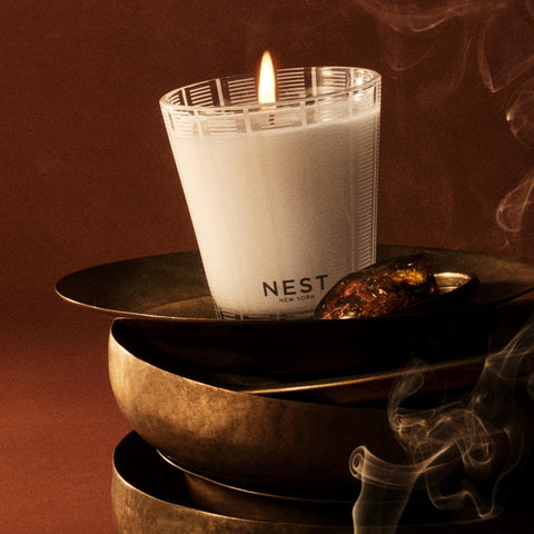 Nest New York earthy woody blend candle delivering warm, exotic notes.