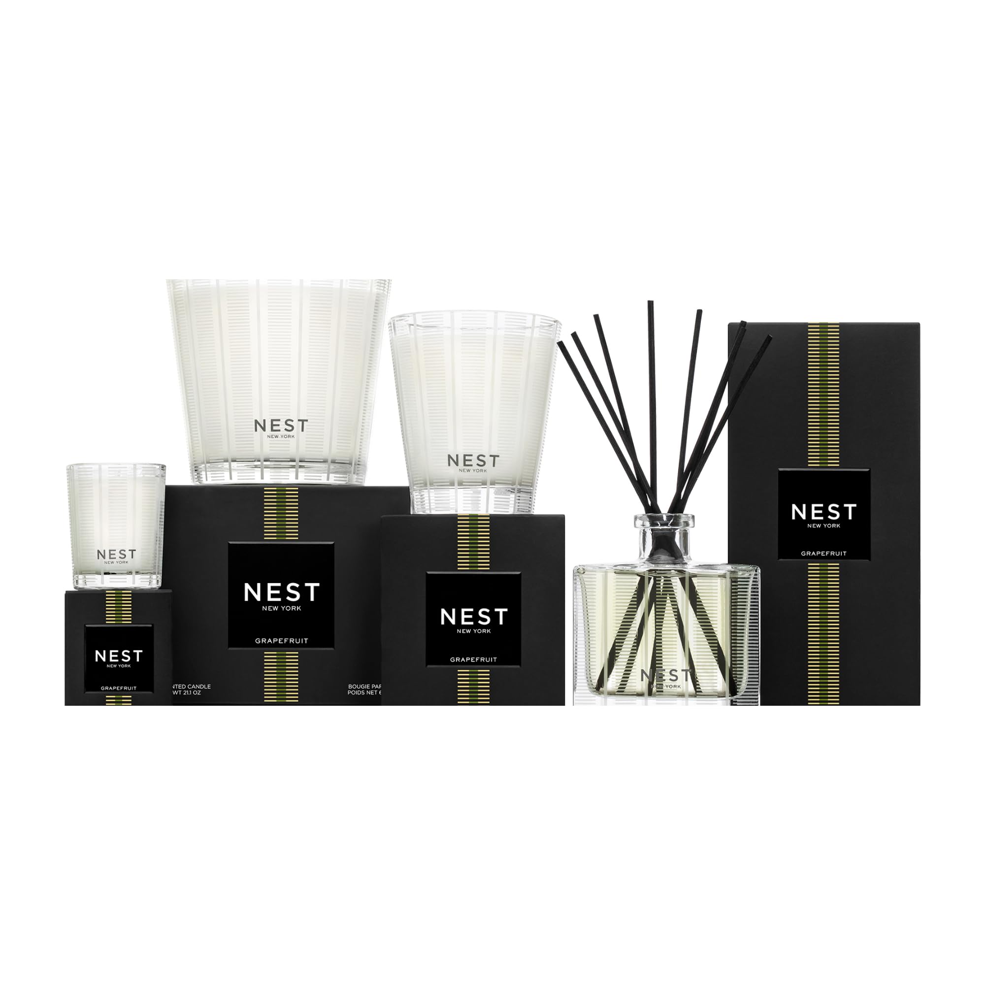 Room scene with Nest New York Grapefruit candle highlighting bright citrus vibes