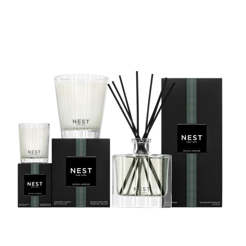 NEST New York Indian Jasmine candle reusable glass vessel for future reuse.