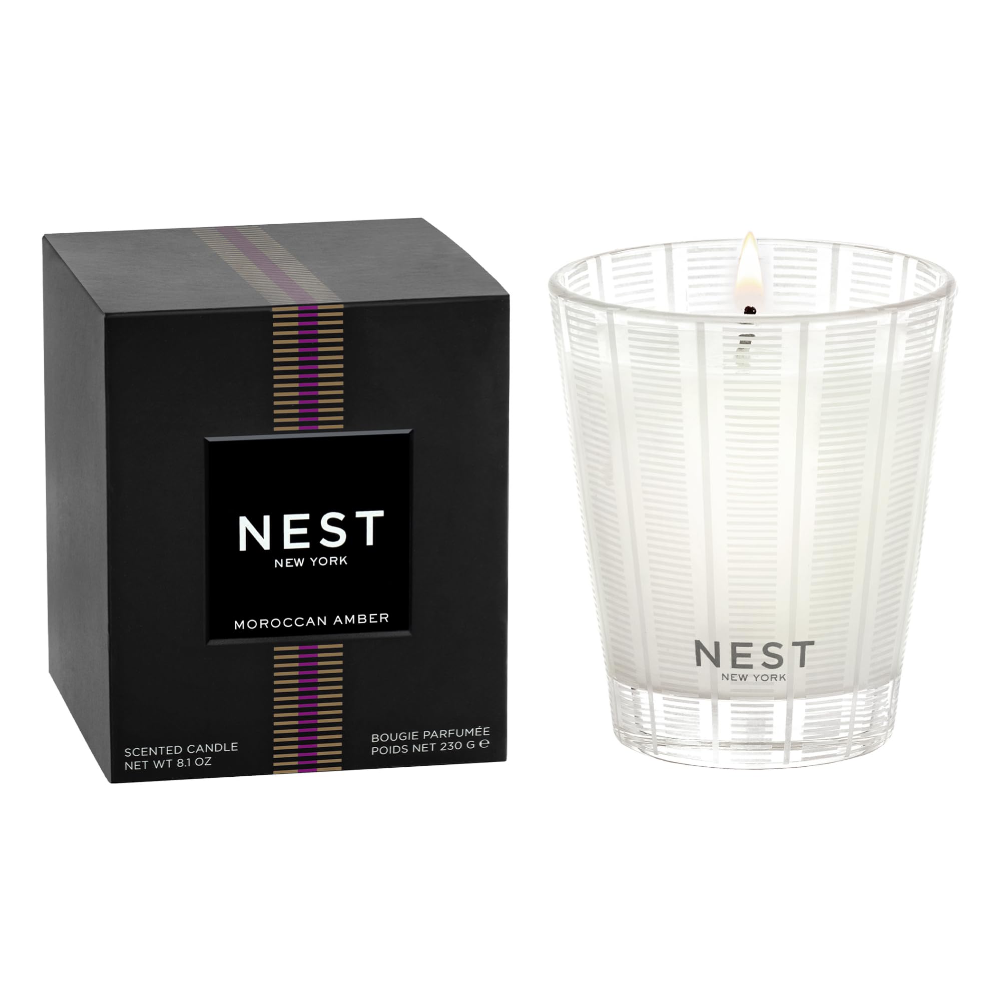 Nest New York Moroccan Amber candle in a glass vessel for a refined living room scent.