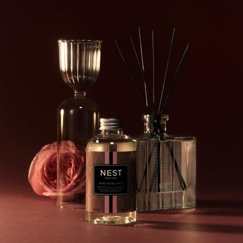Oud and leather hints represented in the Rose Noir & Oud fragrance
