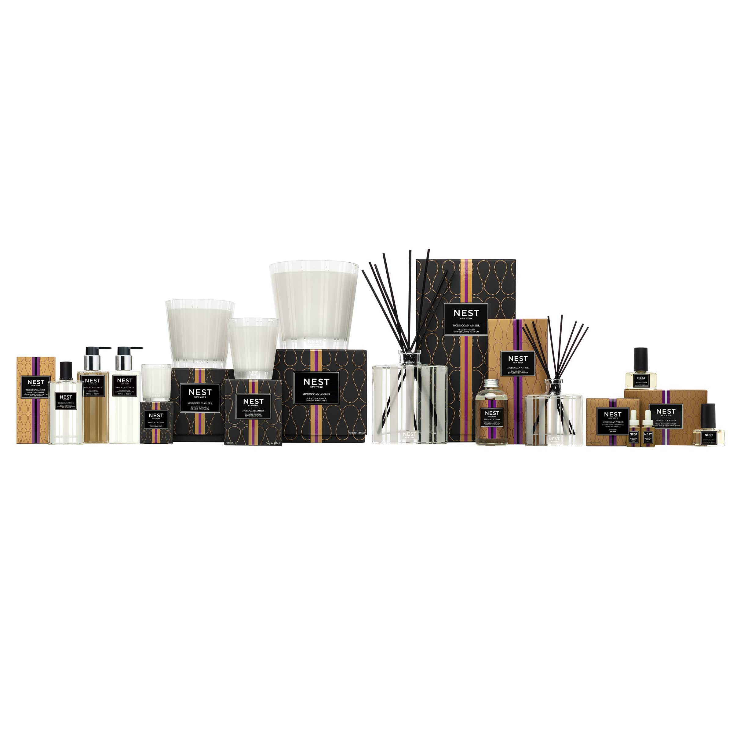 Nest New York wall-diffuser refill in-use demonstrates easy fragrance replenishment.