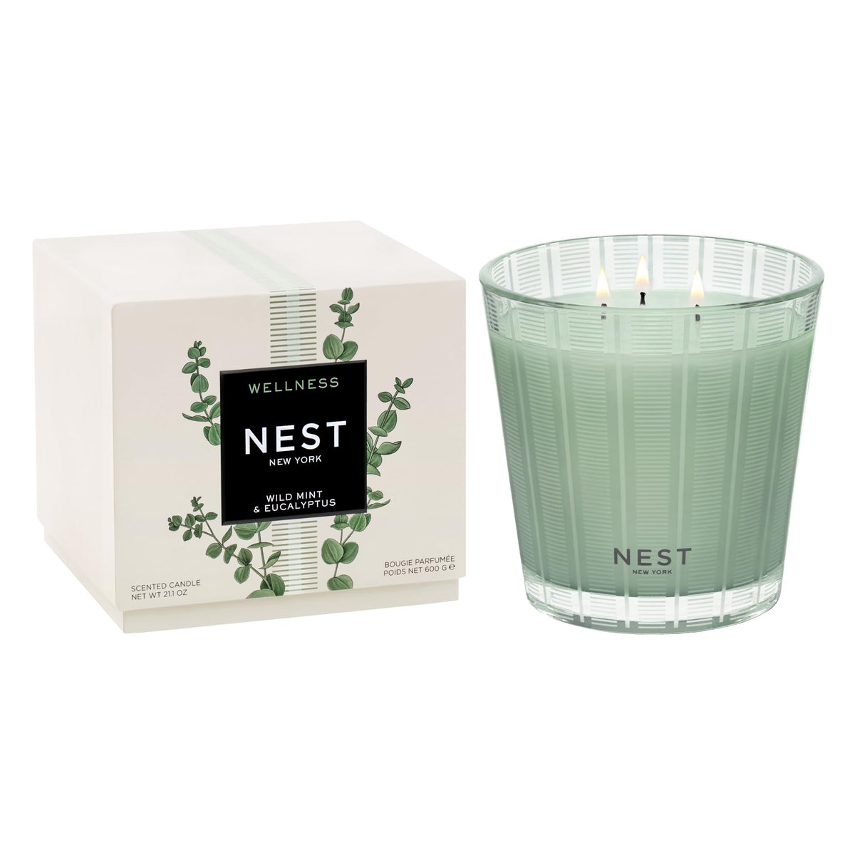 NEST New York Wild Mint & Eucalyptus 3-Wick Candle in reusable glass vessel enhancing ambiance