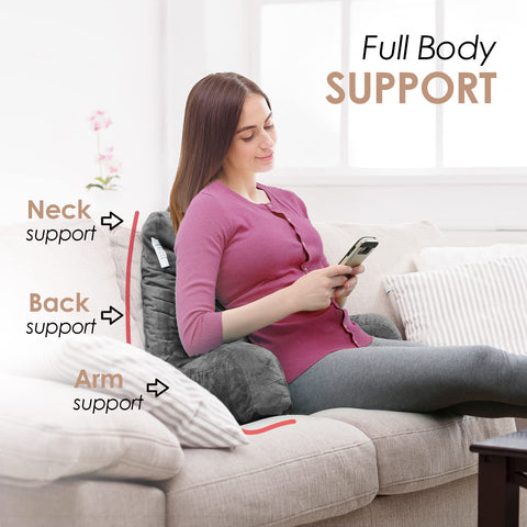 Nestl reading pillow used on couch for relaxed lounging and reading