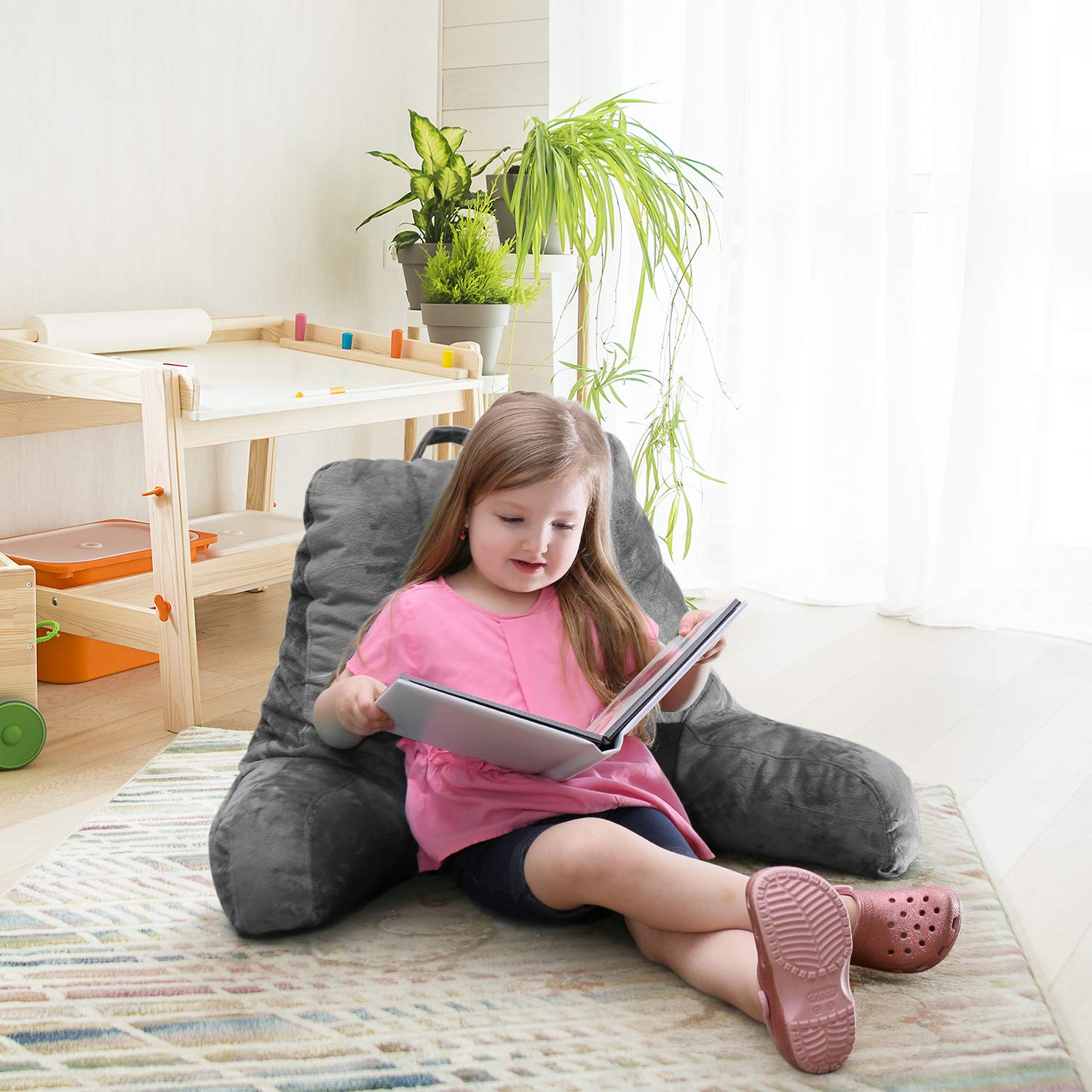 Nestl reading pillow available in small standard and large sizes
