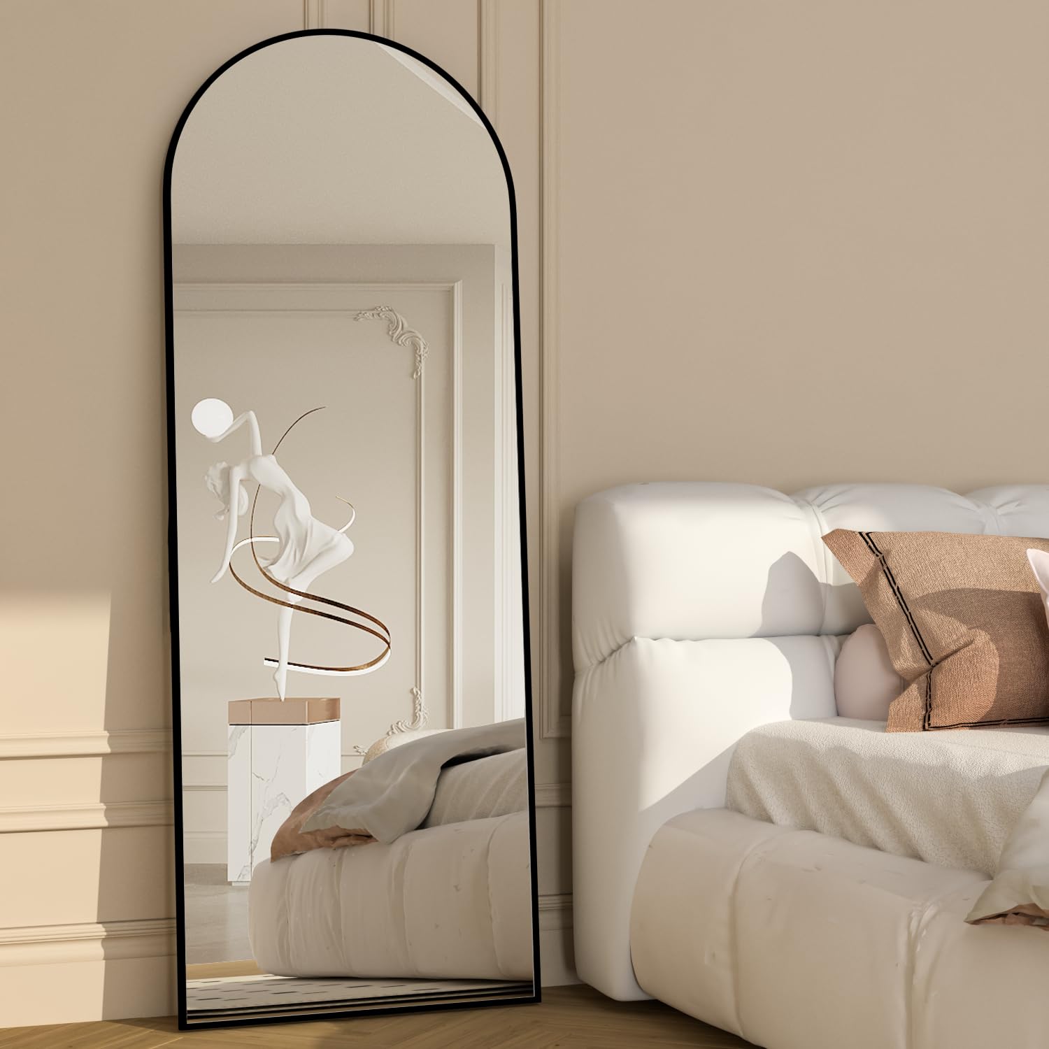 NEUWEABY arch floor mirror in standing position shows full body in natural light.