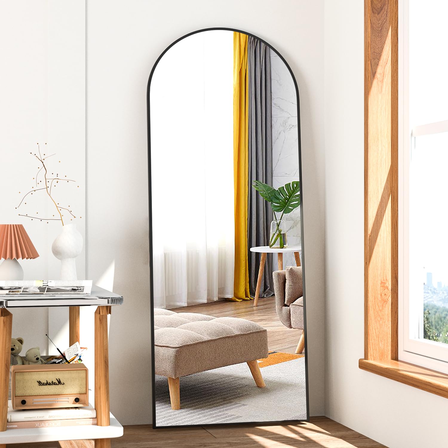 NEUWEABY full-length arch mirror with black frame brightens rooms and reflects full outfits.