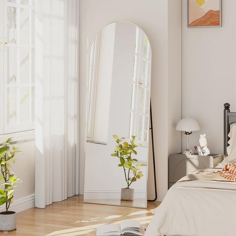 NEUWEABY arched mirror adds a focal point to living rooms.