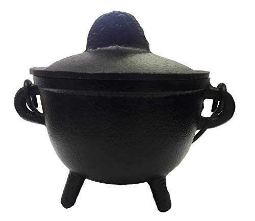 Close-up of textured iron cauldron by New Age Imports with sturdy handle.