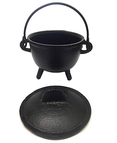 New Age Imports cast iron cauldron with handle and lid for versatile ritual use.