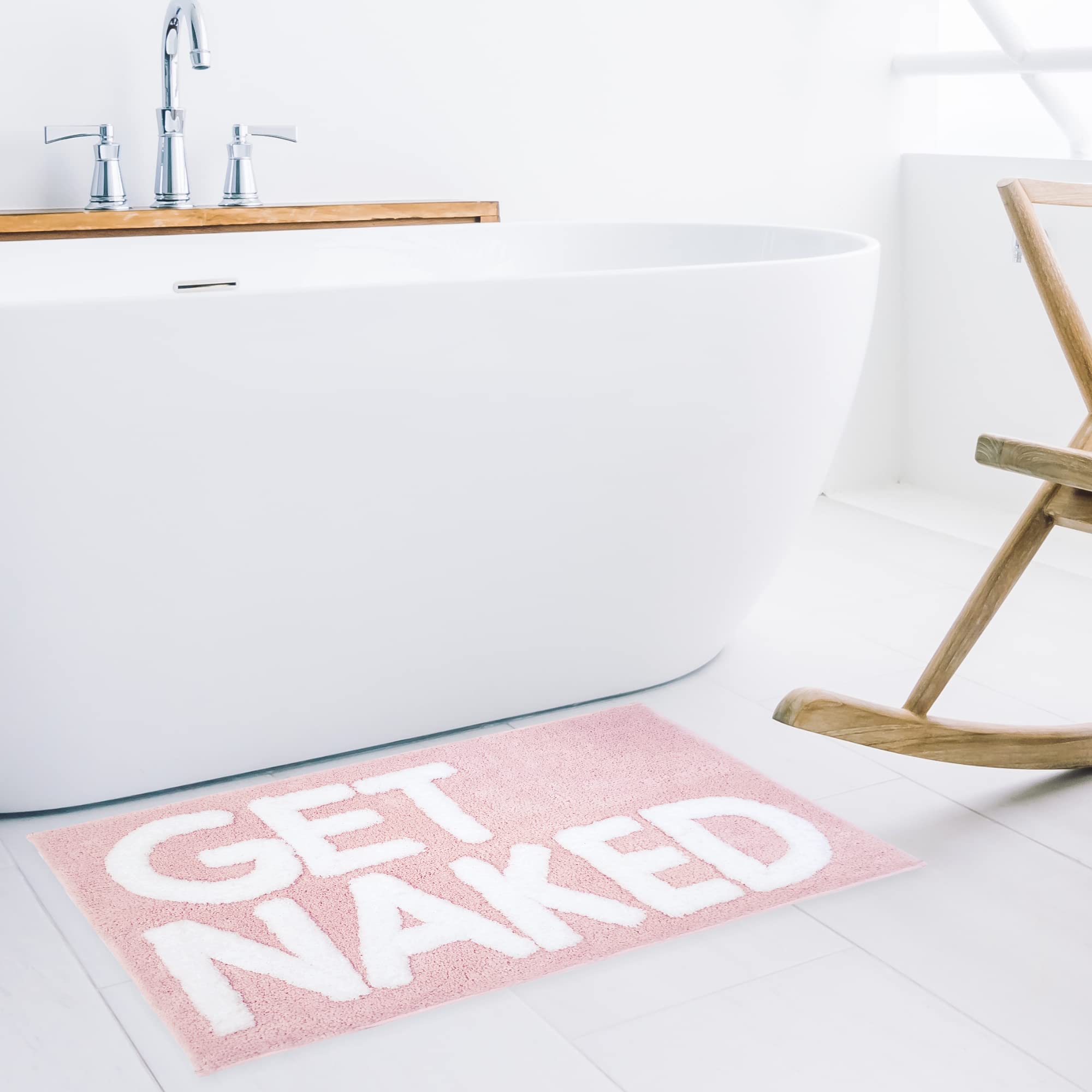 New Mungo Get Naked bath mat pink raised-letter detail; playful design close-up.
